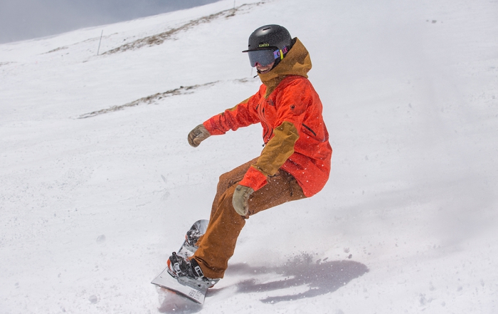 AASI Team Member Chuck Hewitt snowboards in The North Face