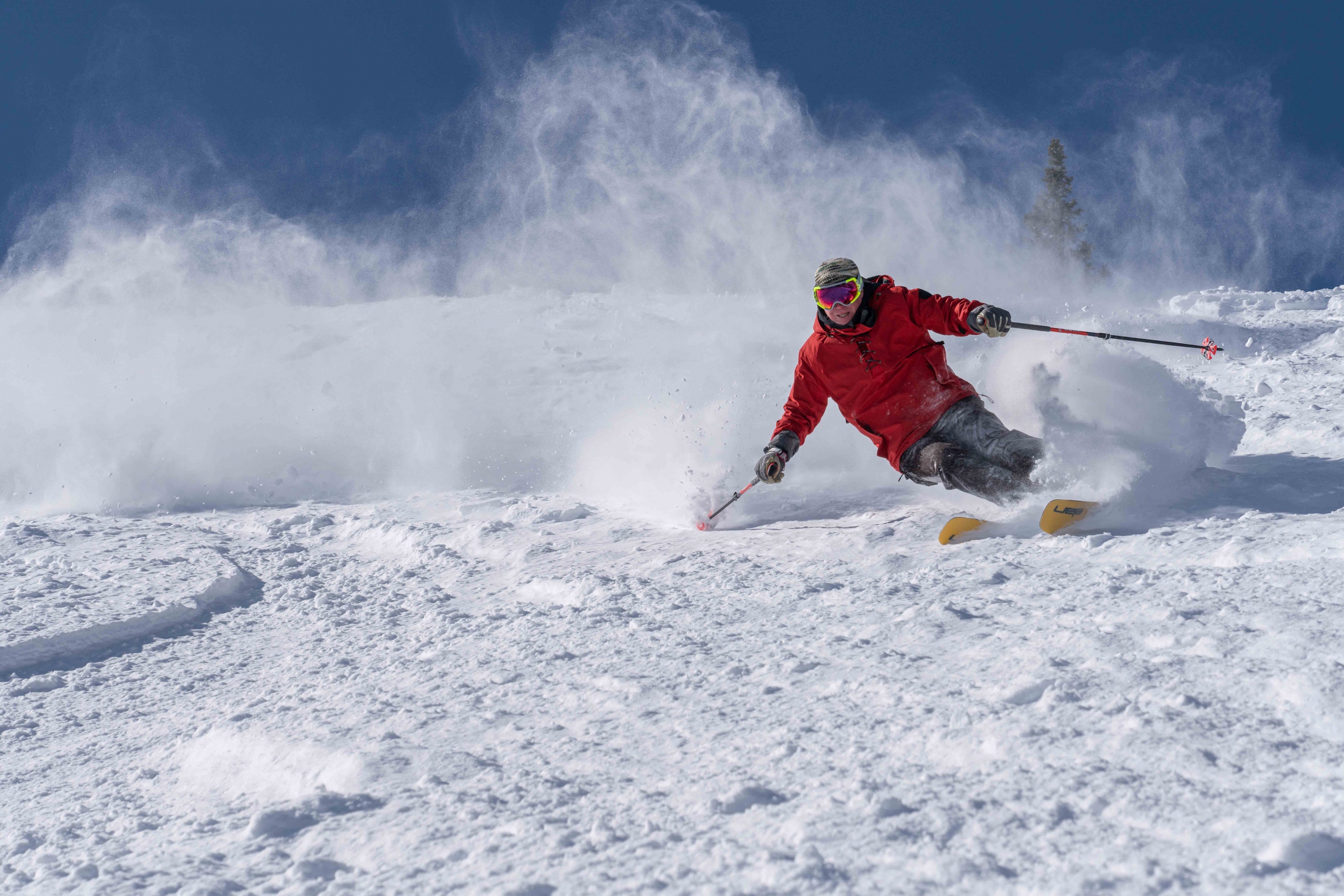 Professional skier Dan Egan skis down a run