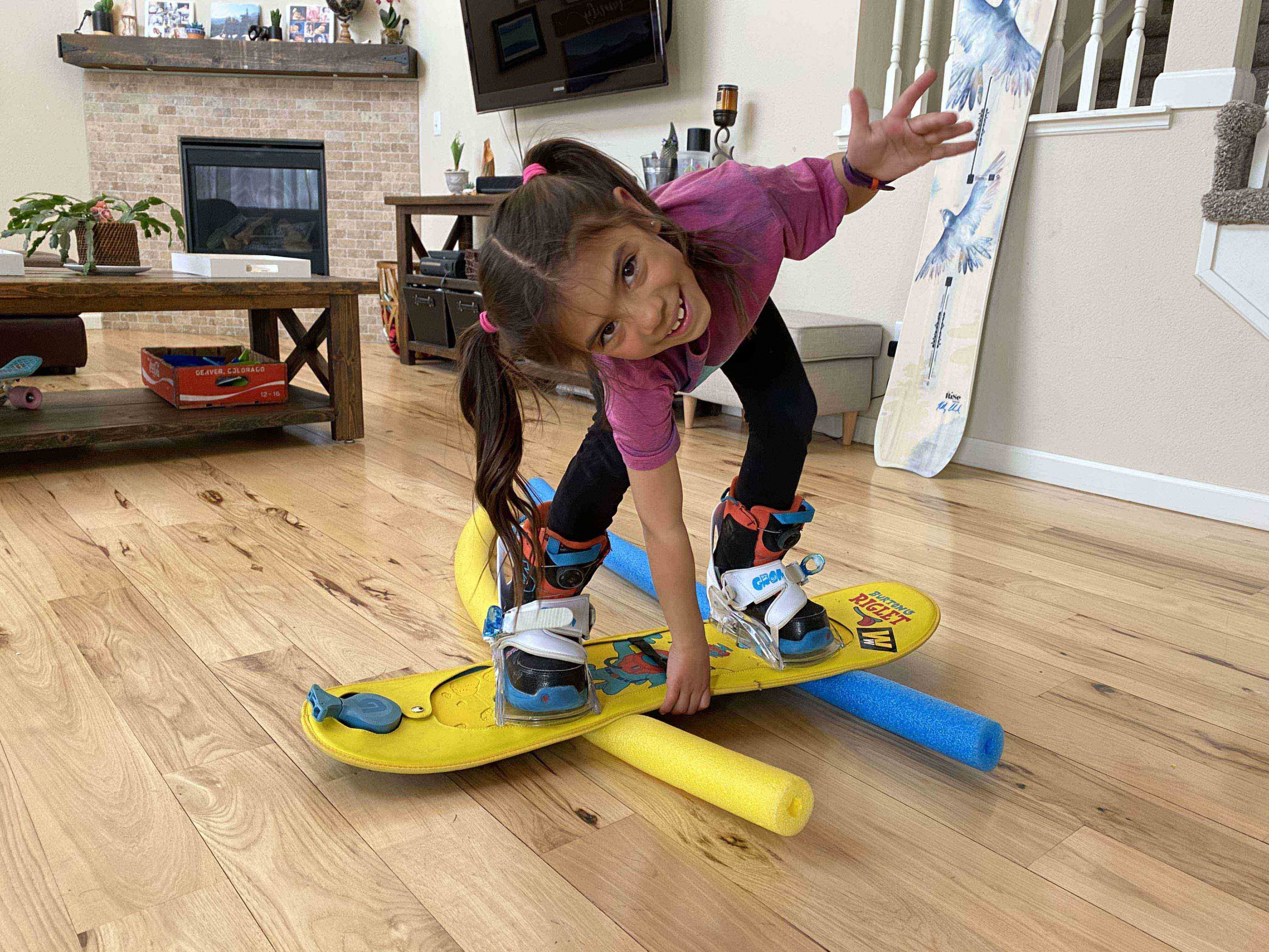 Burton Riglet Ambassador Sophie showing us her best indy grab in her family's living room on her Riglet board