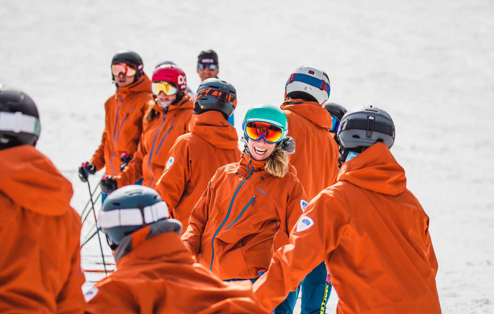 The PSIA-AASI National Team congregates at the base of the Interski demonstration hill