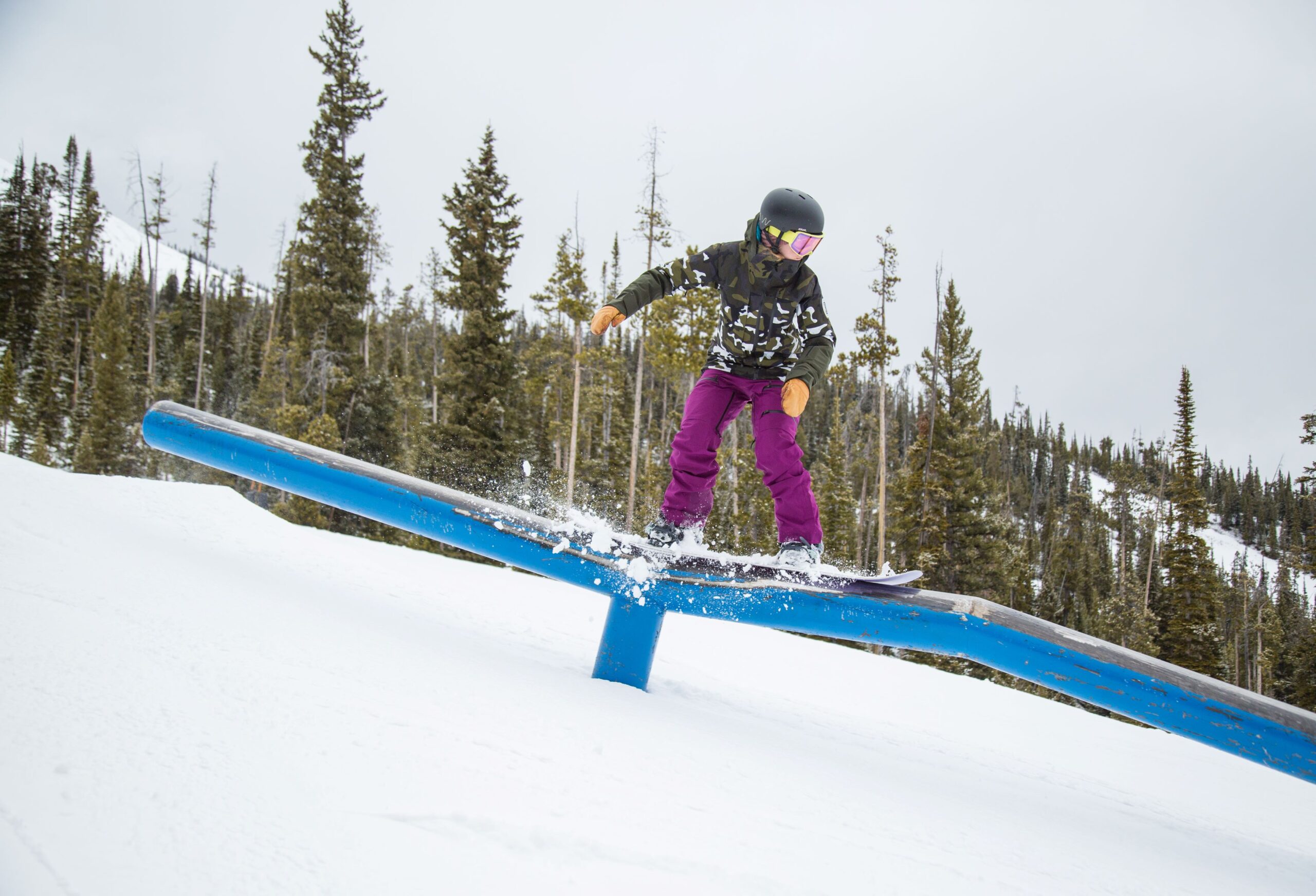 snowboarder on a rail